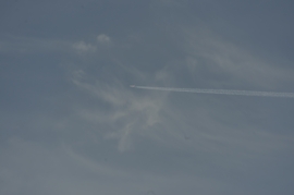 Airliner laying chemtrails
